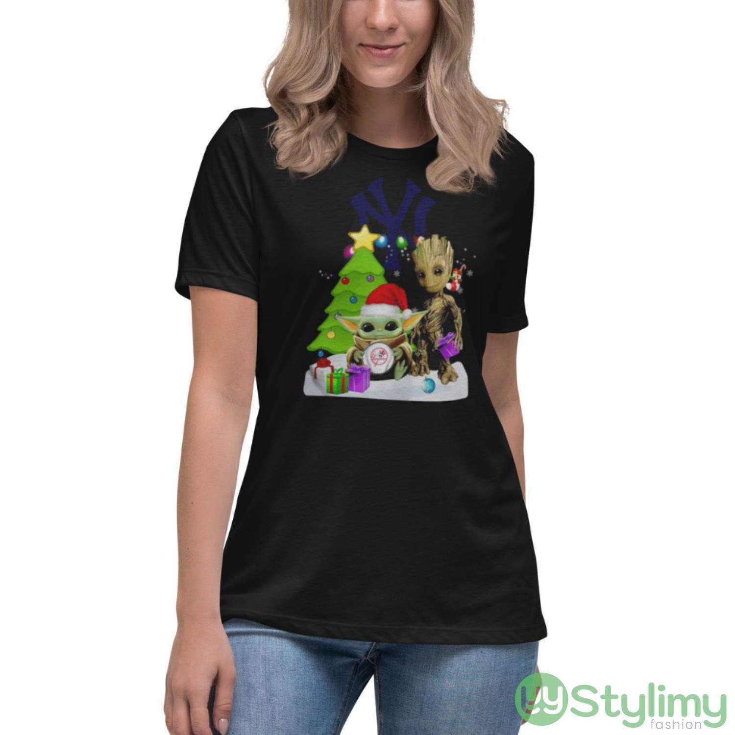 Santa Bigfoot And Baby Yoda Hug New York Yankees Snow Christmas Tree Shirt 6 Santa Bigfoot And Baby Yoda Hug New York Yankees Snow Christmas Tree Shirt - Women's Relaxed Short Sleeve Jersey Tee